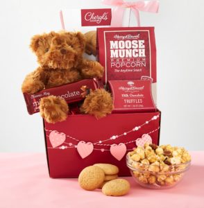 Red Hot Valentines Gifts! A soft cuddly brown bear is surrounded by sweets and chocolate treats makes an adorable valentine's day gift.