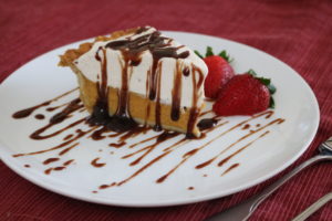 pumpkin pie with chocolate sauce